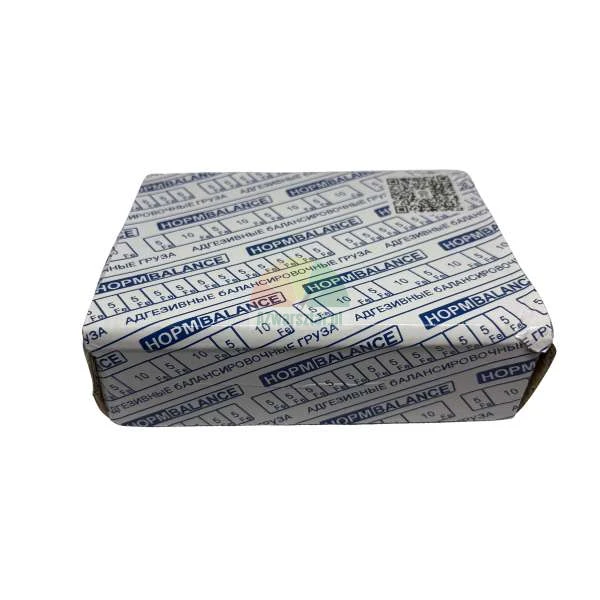 Box of adhesive wheel balancing weights by NORM BALANCE, featuring 5g and 10g iron weights.
