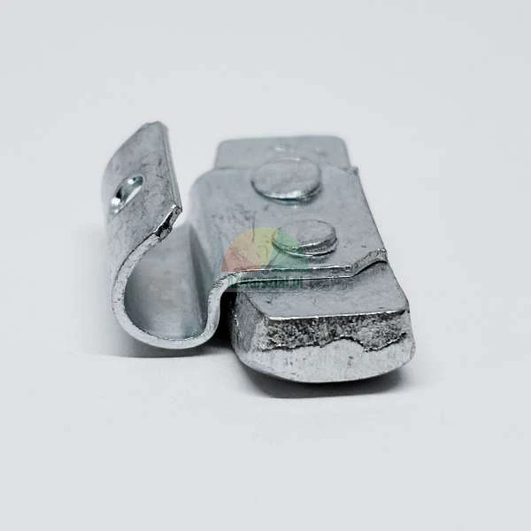 Metal side latch for trailer board, galvanized, side view showing hook and rivets.
