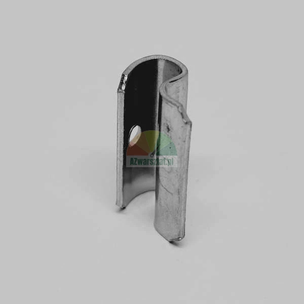 Metal mounting bracket with a hole, profiled steel clamp on a light background.