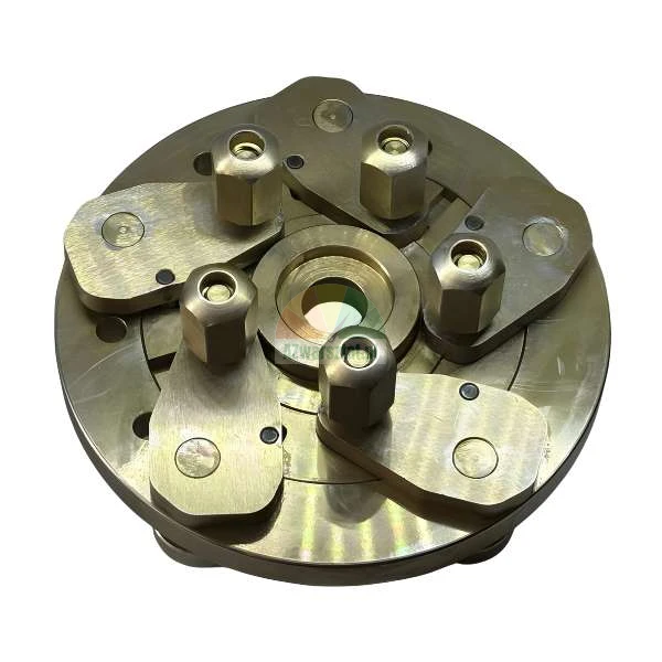 Industrial circular metal lathe chuck with five adjustable golden clamping jaws on a white background.