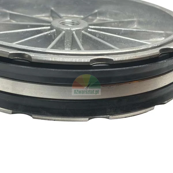Close-up of a circular metal component with two black rubber O-ring seals.