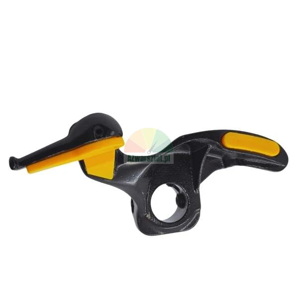 Black tire changer mounting head with yellow protective inserts.