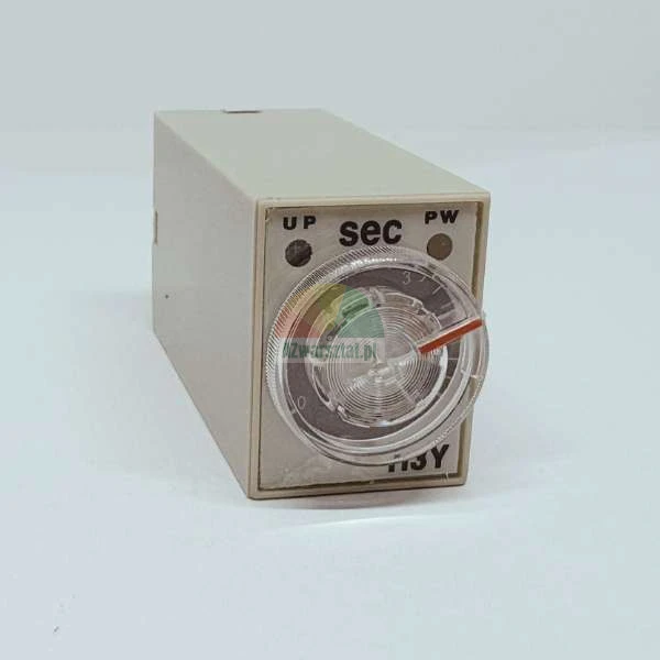 Analog time relay with a transparent dial and red pointer, marked 'sec' for seconds.