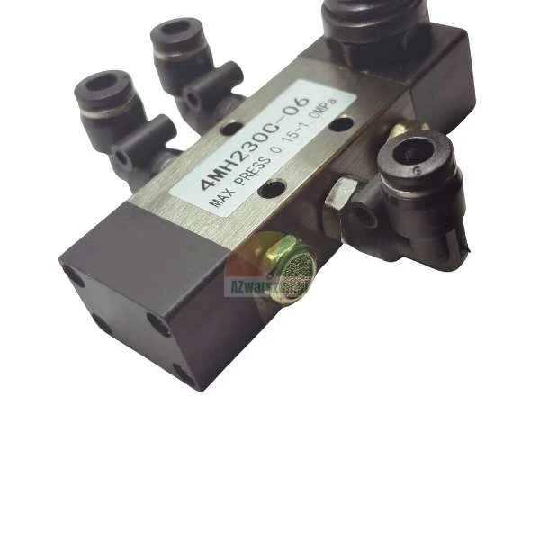 Pneumatic solenoid valve model 4MH230C-06 with black quick-connect fittings and a brass silencer