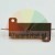 High power resistor with copper housing and mounting holes on a white background.