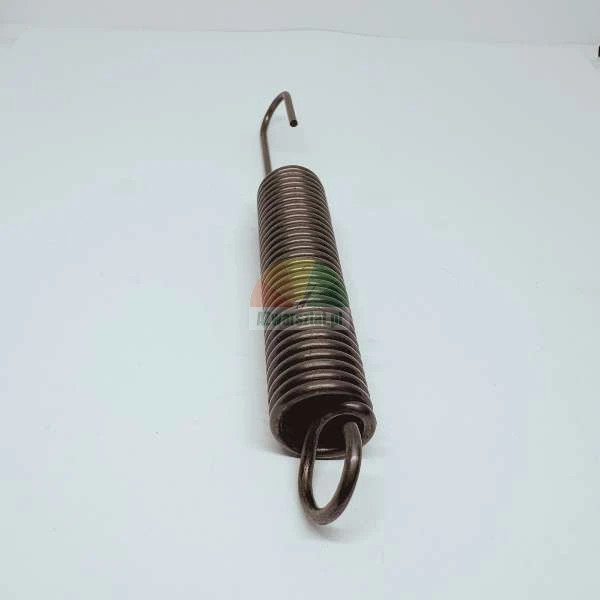 Metal extension spring with hook on light background