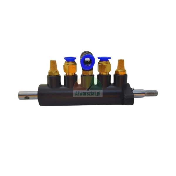 Pneumatic manifold block with blue quick-connect fittings and gold silencers.