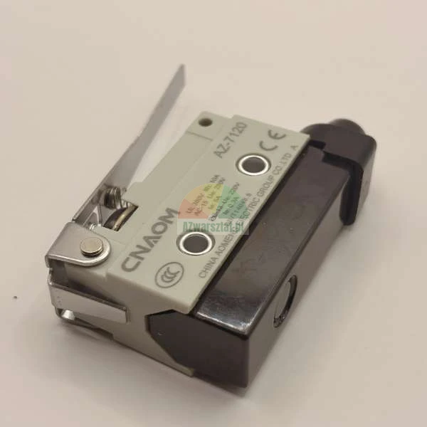 Micro limit switch CNAOM AZ-7120 with a metal lever on a light background.