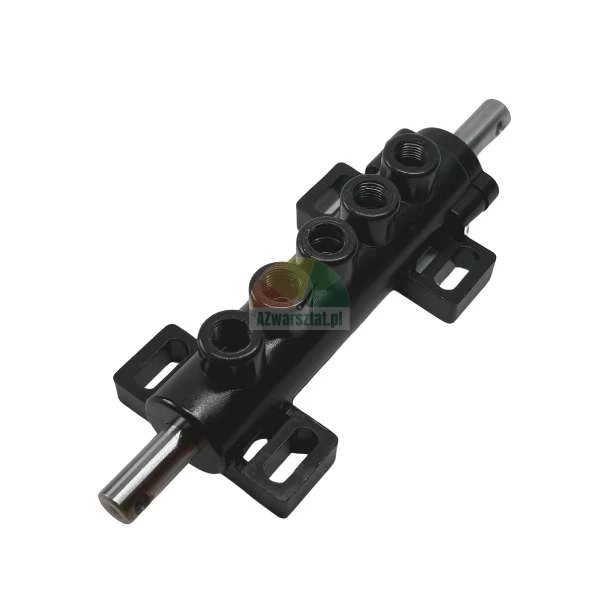 Black metal distributor manifold with five ports and silver shaft ends.