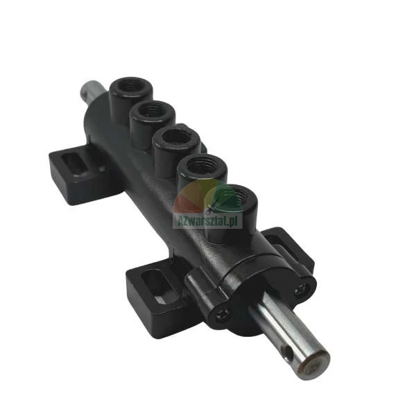 Black manifold with five threaded ports and a silver metal rod on a white background.