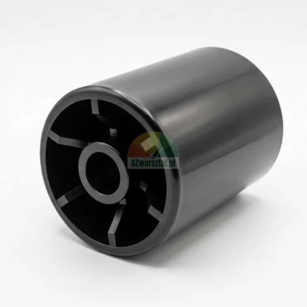 Wide black plastic pressure roller with visible internal ribs.
