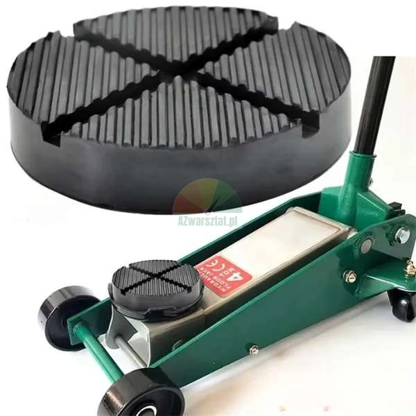 Black rubber jack pad adapter for hydraulic floor jack with grooved surface shown on a green jack