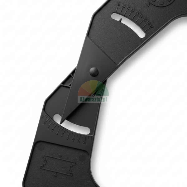 Close-up of a black plastic measuring tool with two scales and a movable pointer.