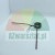Metal torsion spring with two arms on a light background.