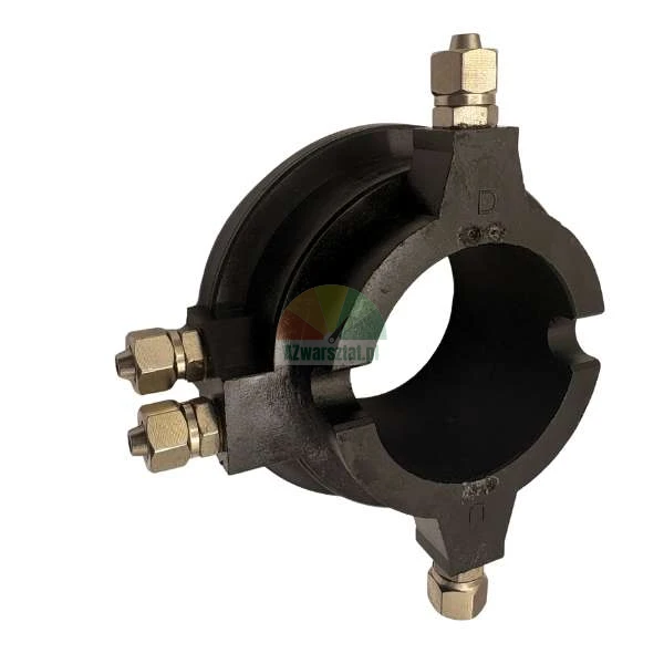 Black industrial circular housing with four metallic grease nipples on a white background