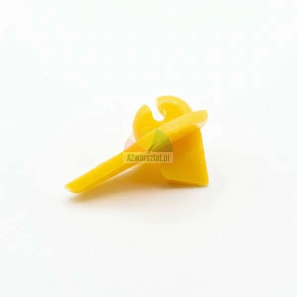 Yellow plastic mounting clip for electric fence wire