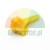 Yellow plastic mounting clip for automotive use on a white background.