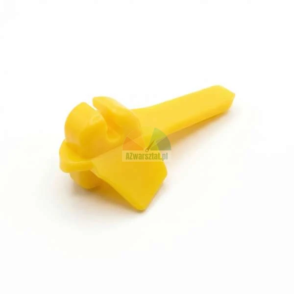 Yellow plastic mounting clip for automotive use on a white background.