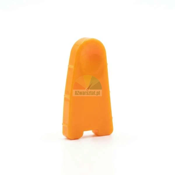 Orange plastic tool for separating building blocks on a white background.