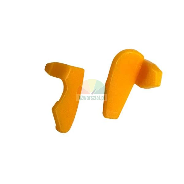 Two yellow plastic spare parts on a white background