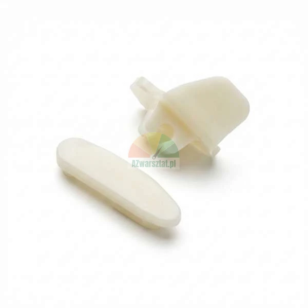 Two small cream-colored plastic components on a white background