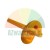 Orange T-shaped plastic fastening element with a hole on a white background.