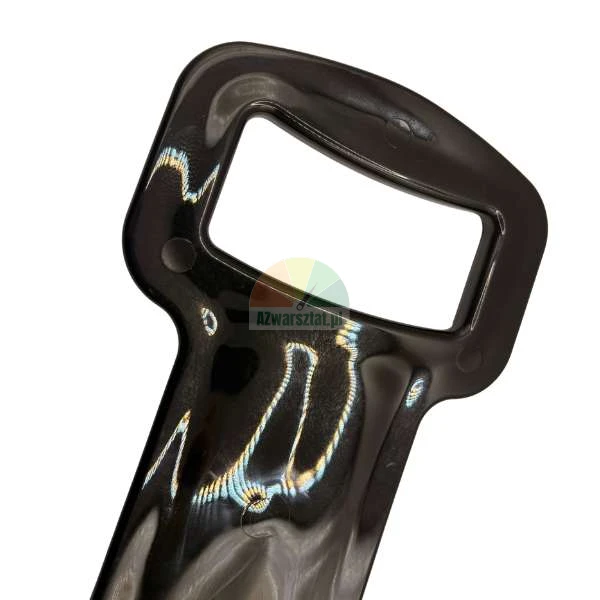 Close-up of a black, glossy plastic handle with an ergonomic shape.