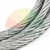 Close-up of a coiled steel wire rope showing its braided texture on a white background.