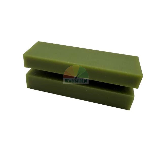 Two rectangular blocks of green olive soap stacked on top of each other against a white background.
