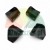 Four black plastic mounting brackets or protective covers shown from different angles on a white background.