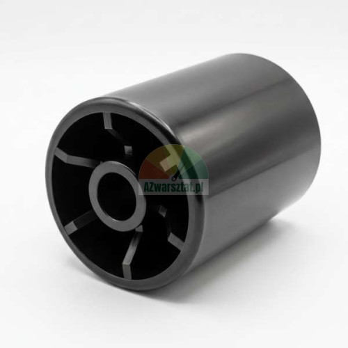 Wide black plastic pressure roller with visible internal ribbing on a light background.