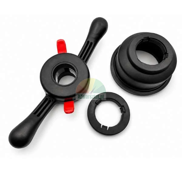 Quick release wing nut for wheel balancer with red release tabs, pressure cup, and ring on a white background.