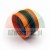 Multi-part hydraulic piston seal with orange, blue, and black components, isolated on a white background.