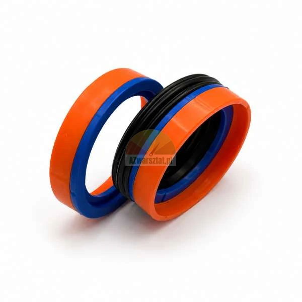 Compact piston seal consisting of orange, blue, and black sealing elements on a white background.