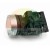 Flat push button switch with a metallic silver bezel and a black plastic contact block on a white background.