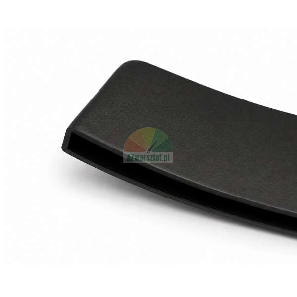 Close-up of a black textured plastic cover with a rectangular slot on a white background.