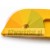 Close-up of a yellow plastic protective element with a rounded edge and a mounting hole.
