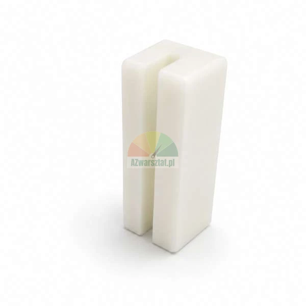 White plastic guide block with a vertical slot on a white background