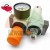 Pneumatic air preparation unit OL-MINI with a pressure regulator, gauge, lubricator, and an orange adjustment knob.