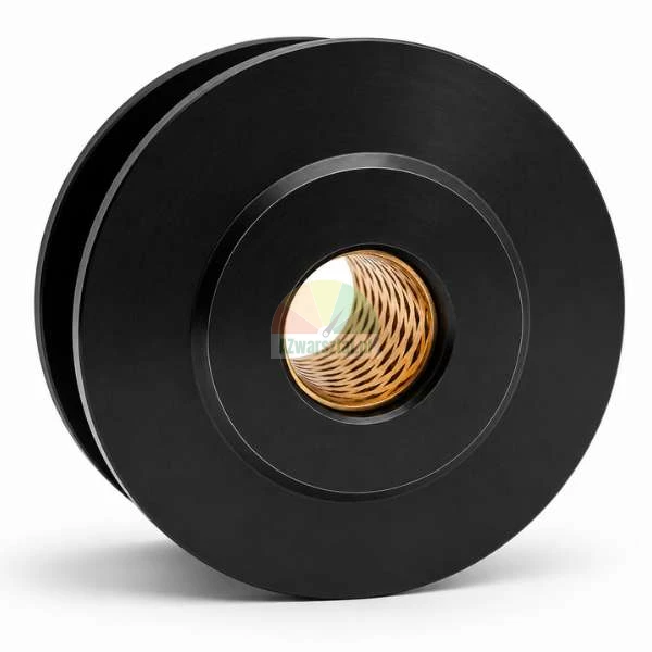 Black pulley wheel with groove and internal bronze sleeve bushing on white background