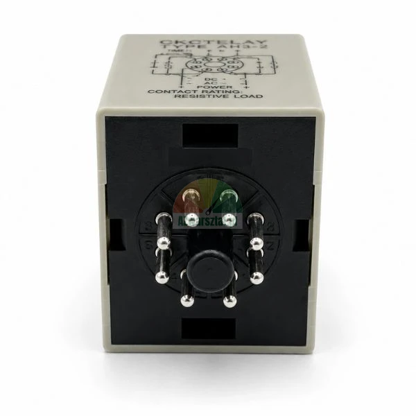 Bottom view of a time relay showing an 8-pin round connector and wiring diagram on the casing