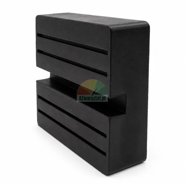 Black rubber car lift block with horizontal grooves on a white background.